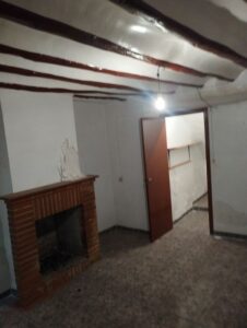 salon con chimena de lumbre inmibicasasbullas